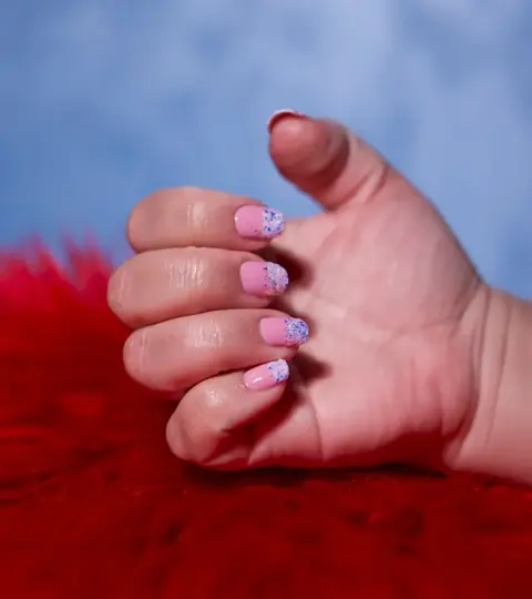 Pink and glitter accents — reference photograph